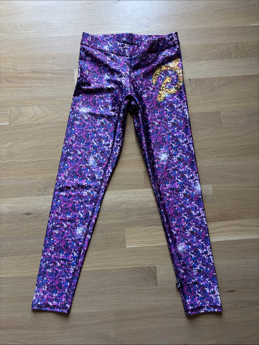 Peloton Terez EUC size small - sequin leggings with gold logo